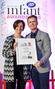 Biddy receiving the Best Family Holiday Destination from Brian (off the telly!) at the Maternity and Infant Awards, held at the Doubletree Hilton Hotel, Dublin. October 2015.