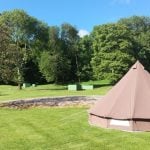 The Bell Tents live beside the sand pit (for maximum sociability for the kids), electric points and water outlets.