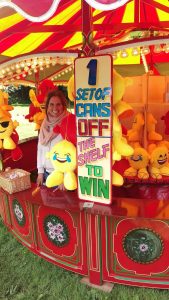 Tracey is ready to test your ability to knock three cans off the shelf - for an emoticon teddy!