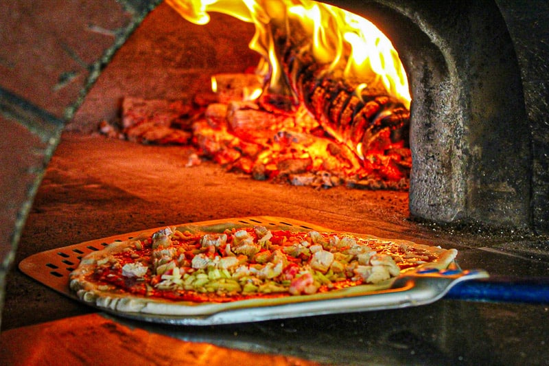 Freshly made woodfire pizza at Gracy's Pizzeria